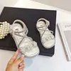 Sandalias para Niña 2025 Verano Nuevos Zapatos de Playa Romanos de Caña Alta con Pedrería para Niña Sandalias de Flor de Princesa