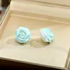 Pendientes de botón de flor de rosa de resina de color macarrón dulce estilo europeo y americano para mujer Pendientes de moda de lujo ligero Pendiente transfronterizo