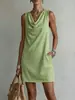 Nuevo vestido corto de mujer de estilo europeo y americano, éxito transfronterizo en TikTok, color liso, drapeado, sin mangas, cuello fruncido, con bolsillos