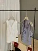 Wgwe8242 Guangzhou Shisanxing Chaleco de Volantes Tridimensional de Nuevo Estilo Primavera/Verano para Mujer Top sin Mangas que Ceñe la Cintura Moderno