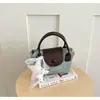 Bolso de mano artístico de estilo coreano para mujer con lazo y lunares, bolso cuadrado pequeño de moda, bolso cruzado versátil para el día a día