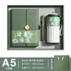 Set de regalo empresarial que incluye un cuaderno, una taza de café y un paraguas, con opción de impresión de logotipo para marca corporativa