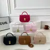 Versión coreana 2026 nueva moda alta calidad elegante versátil simple retro bolso de hombro cruzado bolso tipo silla de montar