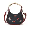 Bolsa de Mezclilla para Mujer con Lazo de Dibujos Animados Nueva Moda Gato Bordado Mini Portátil Cruzado Billetera para Monedas Infantil