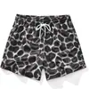 Venta Caliente Transfronteriza de Amazon Pantalones Cortos Estampado de Leopardo Impresión 3D Versátiles Casual Americano para Hombre Pierna Ancha Verano Holgados Venta al por Mayor