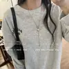 Collar con Colgante Minimalista de Corazón Plateado para Mujer, Cadena Larga de Acero de Titanio para Suéter, Accesorio de Lujo Ligero para Otoño e Invierno