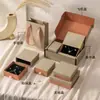 Punto al por mayor Textura de Polvo de Ladrillo Almacenamiento de Joyería Anillo Pendientes Collar Caja Creativa Caja de Regalo para Joyería Caja de Empaque para Joyería