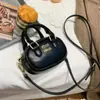 Bolsa Mini Bowling Miu Retro Transfronteiriça, Acessórios de Design de Nicho de Alto Padrão, Bolsa de Mão, Bolsa Transversal Levemente Luxuosa e Estilosa