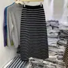 Estilo Retro Elegante de Invierno 2025 Falda de Rayas Gruesas Moda Estilo Perezoso Cintura Elástica Ceñida al Cuerpo para Mujer