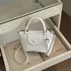 Bolsa pequena niche prateada da moda 2026 nova versão coreana casual bolsa tiracolo bolsa balde ins bolsa de ombro