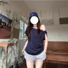 Camiseta Feminina Verão Retro Americana Gola Assimétrica Ombro a Ombro Torcida Manga Curta Look Soltinho Emagrecedor Estilo Preguiçoso Versátil Top Meia Manga
