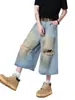 Pantalones Cortos de Mezclilla Rasgados para Niños Verano 2025 Nueva Moda Americana Marca Guapo Holgados Rectos Casuales
