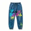 Pantalones de chándal jogger personalizados con efecto desgastado para hombre, con un atrevido diseño de estampado de espuma. Pantalones de chándal para hombre, modernos y de corte holgado