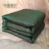 Colcha militar verde simple colcha de aislamiento colcha de invierno ayuda en desastres ropa de cama de dormitorio estudiantil sitio colcha simple de algodón venta al por mayor