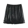 Venta al por mayor de ropa de mujer transfronteriza 2026 otoño nuevo otoño-invierno cuero sintético PU doble capa volante cintura elástica falda