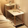 Mesita de noche moderna y minimalista para uso doméstico, adecuada para dormitorios y apartamentos de alquiler; una mesa auxiliar o mesa de centro simple y pequeña que se puede colocar al lado de un sofá
