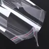 Bolsa OPP autoadhesiva en stock bolsa autoadhesiva impermeable a prueba de humedad bolsa de embalaje para ropa bolsa de plástico transparente bolsa autosellable
