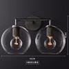 Lámpara de pared decorativa de diseño minimalista nórdico posmoderno de vidrio para sala de estar, lámpara de noche para dormitorio sencilla y personalizada para el hogar.