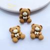 Accesorios de resina para bricolaje, venta al por mayor, funda para teléfono móvil, accesorios de bricolaje, material hecho a mano, tocado, pegatinas para taza de agua, tacto mate, oso naranja