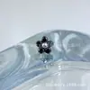 Aleación de Titanio Astmf-136 1.5 Diamante Flor Pequeña de Cinco Pétalos Arete de Titanio G23 Rosca Interna Cabeza de Joyería para Piercing de Zirconia