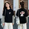 Camiseta de manga larga de algodón puro para niñas, top base elegante y moderno para niños, adecuada para primavera y otoño de 2026, con un diseño de imitación de dos piezas
