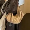 Nuevo bolso de mano retro de gamuza coreano 2026, bolso de hombro simple y exquisito para mujer, estilo otoño e invierno, adecuado para ir al trabajo