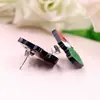 Pendientes de Navidad Transfronterizos Europeos y Americanos Pendientes de Navidad Acrílicos Festivos del Grinch Estilo Ins Simple y Versátil
