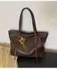 Bolsa de Grande Capacidade Feminina 2026 Nova Tendência Outono Inverno Moda Retrô Versátil para o Dia a Dia Bolsa de Ombro Única Bolsa Tote