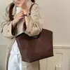 Bolso de mano casual de nicho nuevo, gran capacidad, versátil para el trabajo, color sólido, textura de cuero suave, bolso de hombro para mujer