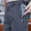 Pantalones casuales versátiles de múltiples bolsillos con cremallera al por mayor transfronterizos para hombre, estilo nuevo fino de primavera y otoño, pantalones rectos holgados de negocios para hombre