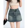 Falda corta vaquera retro para mujer, nueva falda elástica de cintura alta en línea A para el verano de 2026, falda bodycon sexy estilo americano