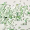 Directo de fábrica nuevo porcelana azul y blanca dos colores piedra redonda pequeña vidrio irregular uña DIY piedra redonda pequeña 4 colores Piedra de río