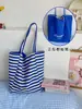 Bolsa de Ombro Americana de Nylon Listrada Dupla Face Retrô de Nicho de Alta Qualidade Bolsa de Lona de Grande Capacidade Relaxada para Primavera e Verão