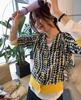 Nuevo cárdigan de punto de moda con estampado de pata de gallo, cárdigan de mujer con mangas largas a juego de colores.