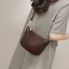 Bolsas 2025 Nova Bolsa Feminina Outono e Inverno Couro Genuíno Bolsa de Ombro Transversal Bolsa Pequena de Alta Qualidade para o Dia a Dia Bolsa Bolinho