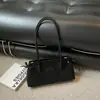 Bolsa de Ombro/Axila da Moda para o Dia a Dia de Mulheres 2026 Novo Modelo Simples Versátil Bolsa de Ombro/Axila Bolsa de Mão de Nicho Texturizada