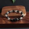 Pulseira de obsidiana prateada natural corajosa cristal natural dança do leão Coringa pulseira de alto senso atacado fornecimento ao vivo treme