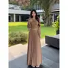 Estilo Coreano Sexy Maduro Malha Decote V Manga Longa Outono 2026 Novo Cintura Alta Plissado Saia Longa Conjunto de Duas Peças