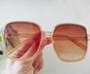 Gafas de sol 2023 nuevas para hombre y mujer con caja a juego, diseño de arroz con degradado de uñas, pieza oceánica, pequeño libro rojo con gafas de sol al por mayor