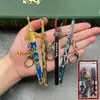 Espada de Metal Espada de Ángel Corazón de Polvo tamaño pequeño Modelo de Arma Fría Mini Espada Pequeña para Niños Colgante Llavero