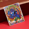 Dzambala Negro pintado tibetano pintura Thangka pintada a mano lienzo central impresión microchorro Thangka cultural y creativo Zakiralam al por mayor