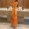 Colección de verano nueva para mujer europea y americana transfronteriza 2026: elegante vestido estampado tipo resort con cuello en N y abertura