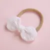 Venta caliente europea y americana 8 * 4cm bordado a máquina de encaje algodón puro lazo diadema para bebé súper suave sin costuras accesorios para el cabello de niña