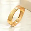 Pulseras Populares Transfronterizas Europeas y Americanas Ins Normcore Pulseras con Patrón de Onda Asimétrico Pulseras Metálicas Brillantes Joyería para Mujer