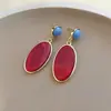 Nuevos aretes ovalados de resina estilo chino, lujo ligero, moda de alta gama, aretes vintage, accesorios versátiles y elegantes de nicho para mujer