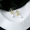 Pendientes huecos de amor romántico francés Diseño de nicho vintage Pendientes de perla Distintivos Exquisitos Pendientes de circonita para mujer