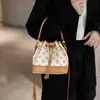 Bolso de mujer de alta gama, modelo nuevo 2026, estampado vintage, bolso tipo cubo versátil y elegante, bolso de hombro y cruzado a la moda