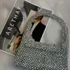 Nova bolsa de mão com design de nicho metal imitação prata banhado a ouro bolsa de contas flip quadrada de ombro bolsa de mão tecida