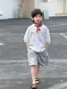 Camisa de Tricô de Seda Gelada para Meninos Little Shop de Algodão Verão Manga Curta Infantil 2026 Novo Estilo Coreano Simples Tendência Cor Sólida Respirável Roupa Infantil