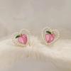 Pendientes de botón de melocotón 2023 Invierno Nuevo diseño de nicho Pendientes de perla de amor Pendientes súper lindos y dulces